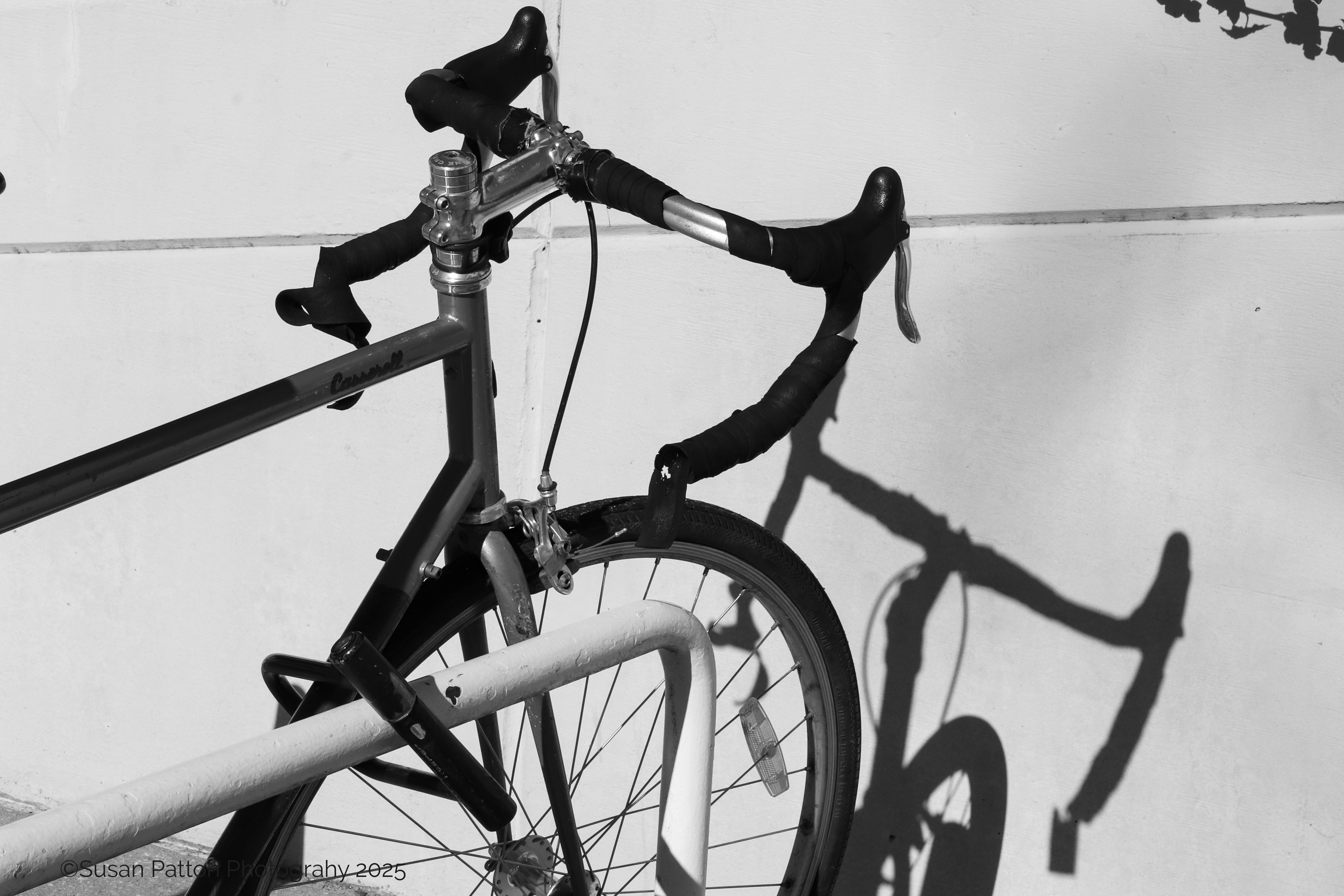 Bicycle Shadow photograph taken by Susan Patton